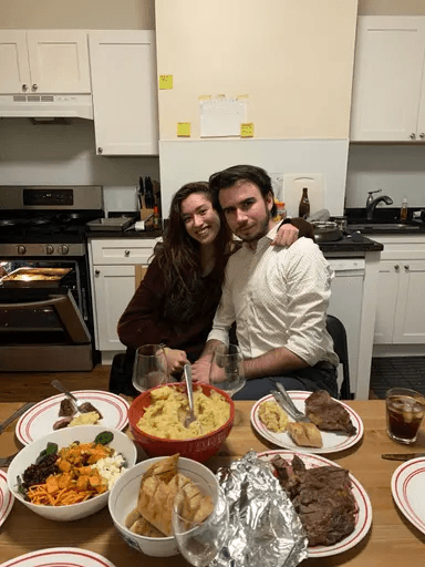 Shannon and Cole sharing dinner at home
