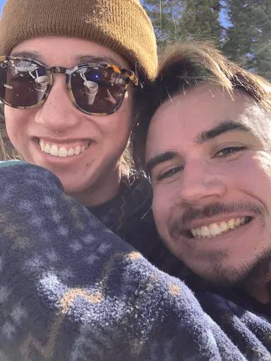 Shannon and Cole smiling in a winter selfie