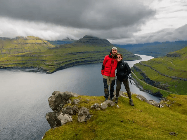 Shannon and Cole overlooking the Faroe Islands